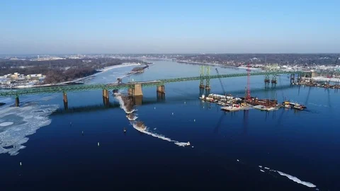 Large Cranes on Barge in River Building Bridge Aerial View Stockbeeldmateriaal 104890882