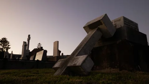 Large cross cemetery stone toppled over 6K Stock-Footage 302961196