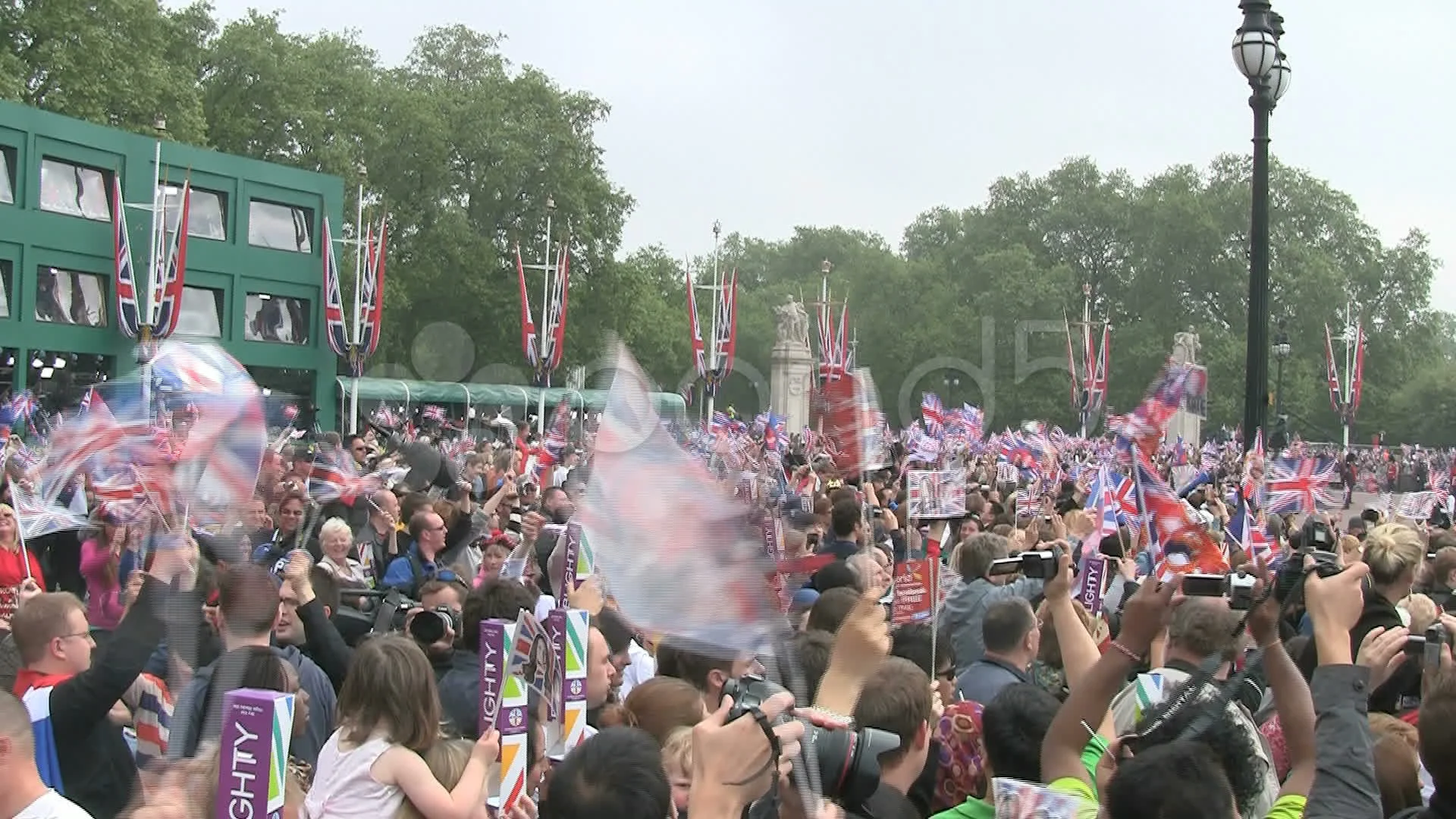 Large crowd cheer and wave flags for Stock Video Pond5