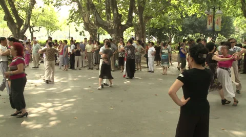 Large crowd dancing under trees 2 Stock Footage 37704872