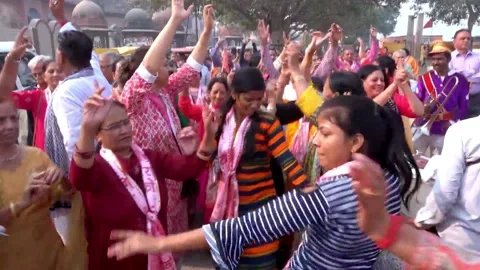 Large Crowd of Devotee's Dancing During Road Show in Vrindavan Stock Footage 132086691