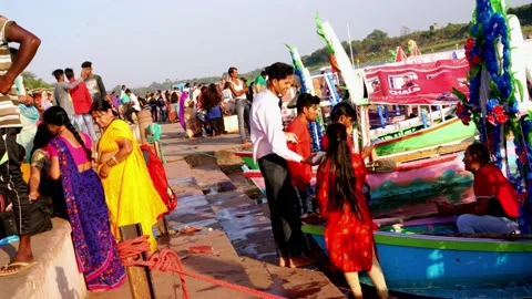 Large Crowd of Devotee's In river Side along with Beautiful Boats Stock Footage 133887647