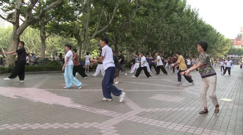 Large crowd doing Tai Chi Stock Footage 37705333