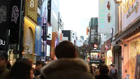 Large crowd on downtown street Stock Footage 8984702