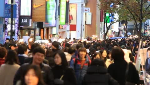 Large crowd on downtown street Stock Footage