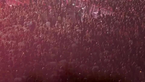 Large crowd enjoying concert with stage lights Stock Footage 337135672