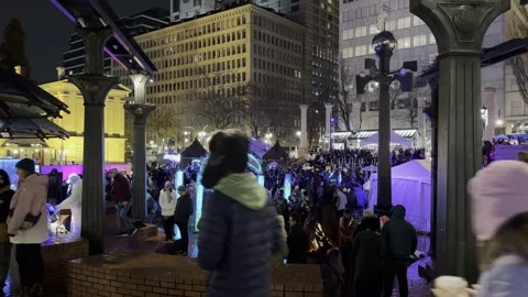 Large crowd enjoying Winter Light Festival in Portland, Oregon Stock Footage 326866463
