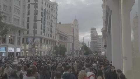 A large crowd on a main street in Madrid, Spain Stock-Footage 345030023