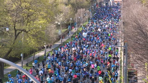 Large crowd of marathon runners in the streets of Toronto race Stock Footage 62922370
