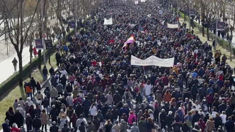 Large crowd marches in protest against Public Healtcare cuts, Madrid, 4K Stock Footage 233044728