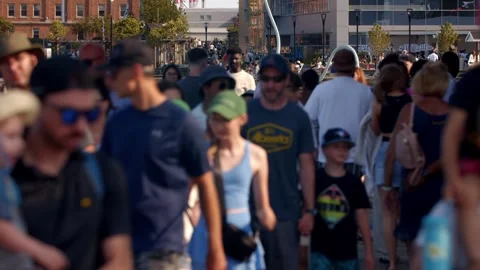 Large Crowd Moves Across Halifax Waterfront Street Blurry Urban Daylight Scene Stock Footage 315355637