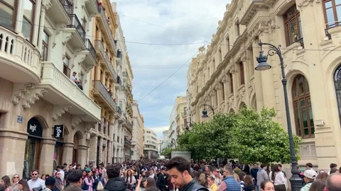 Large crowd of people walking after Mascletás in Valencia, Spain Stock Footage 332736949