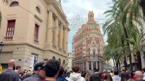 Large crowd of people walking after Mascletás in Valencia, Spain Stock Footage 332736972