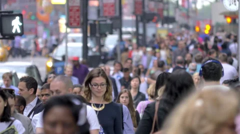 Large crowd people walking crowded street pedestrians commute NYC New York City Stock Footage 53607609