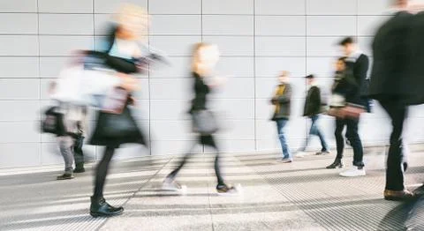 Large crowd of people walking Stock Photos