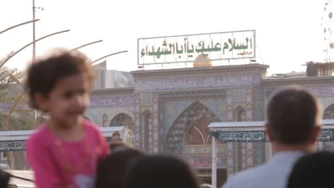 Large crowd of pilgrims in front of Imam Hussein's Shrine, Karbala Stock Footage