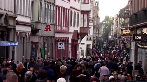 Large Crowd slow on busy street Heidelberg Germany Stock Footage 43668403