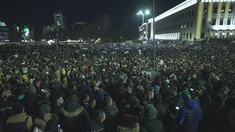 A large crowd of thousands of people protesting against the state mafia Stock Footage 324557084