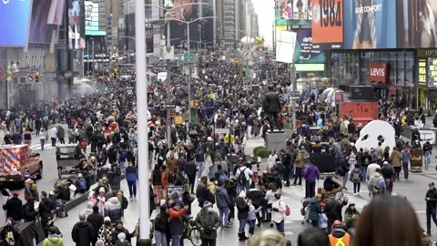 Large crowd on Times Square in NYC after Thanksgiving Parade in Manhattan Stock Footage 200778740