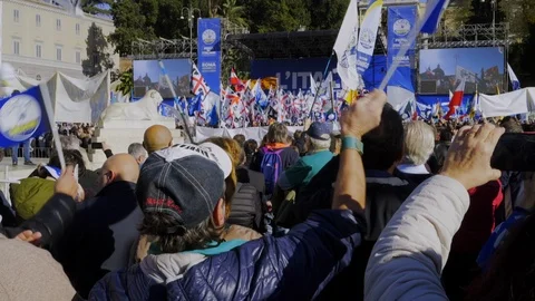 A large crowd waves flags during Salvini's speech Stock Footage 99752233