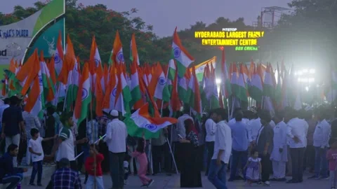Large crowd waving Indian flag on political protest rally with heavy lights Stock Footage 342031496