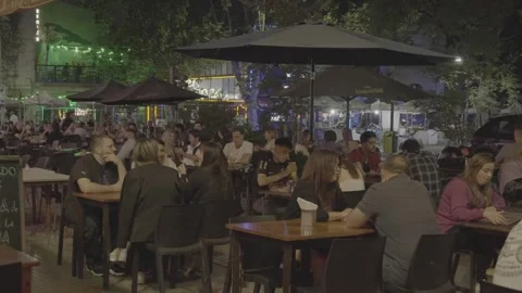 Large crowds and music at cafes in Buenos Aires, Argentina Stock Footage 345139902