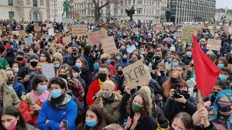 LARGE CROWDS GATHER IN RESPONSE TO SARAH EVERARD MURDER UK 4K Stock Footage 150363775