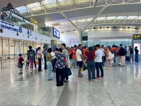 Large crowds of passengers are queuing for procedures at the Re-check area Stock Photos