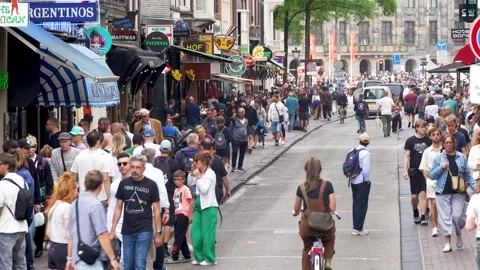 Large crowds of tourists in front of Dam Square, overtourism in Amsterdam 스톡 동영상 314978370