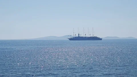 Large cruise ship with five masts silhouette on the horizon. Stock Footage 82808150