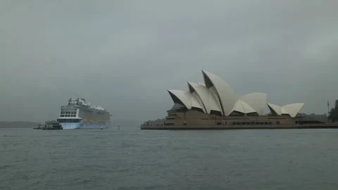 A large cruiseliner passes Sydney Opera House in the mist 6K Stock Footage 302518797