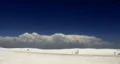 Large cummulus cloud pack over desert HD Footage