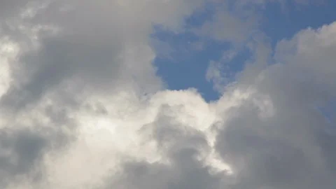Large cumulous clouds in the sky Stock Footage 104877165