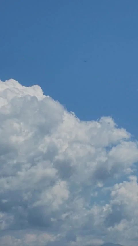 Large Cumulus Cloud and Blue Sky Copy Space Stock Footage 346786640