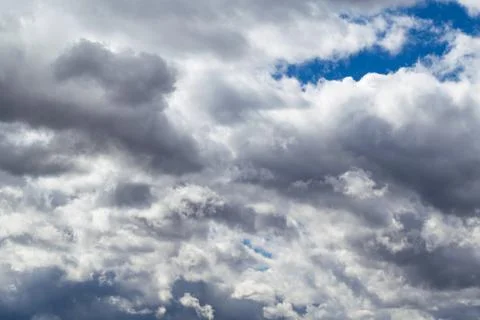 A large Cumulus cloud in the blue sky. Stock Photos