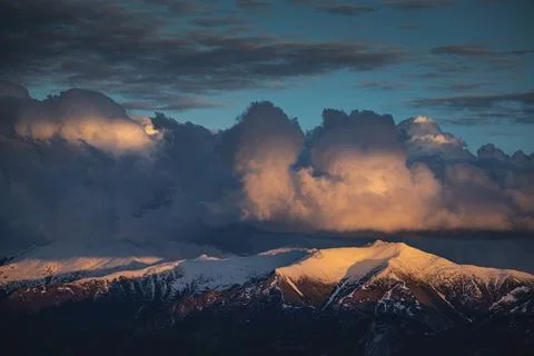 Large cumulus clouds over mountain range in caucasus, mountains of georgia .. Stock Photos