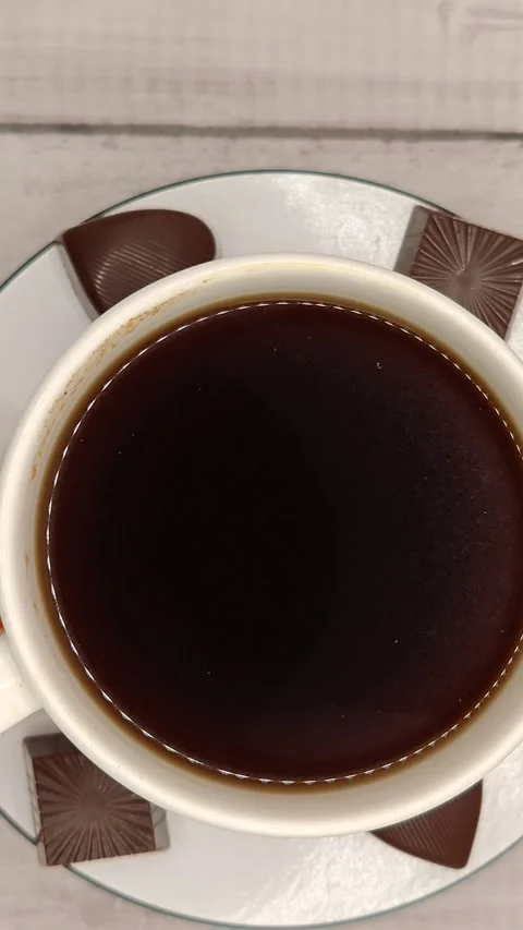 A large cup of coffee is rotating close-up Stock Footage 329939138