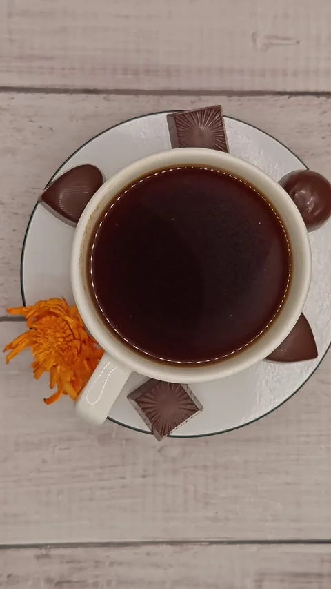 A large cup of coffee on a saucer Stock Footage 329939107