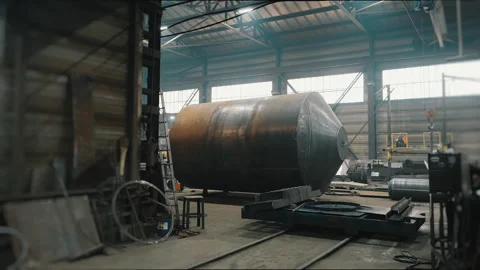 Large cylindrical metal structure in an industrial boiler plant. Stock Footage 306541540