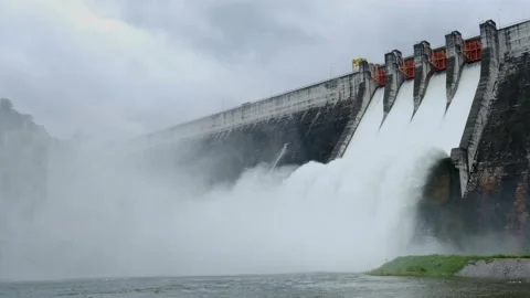 A large dam is draining because of heavy rain. Stock Footage 171851325