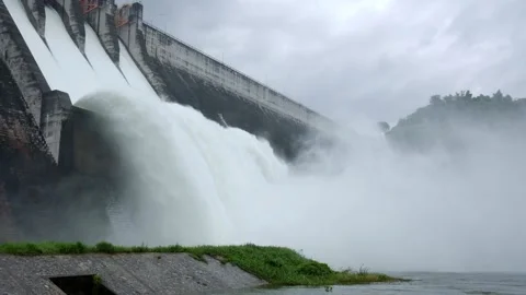 A large dam is draining because of heavy rain. Stock Footage 171851327