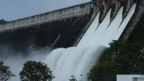 A large dam is draining because of heavy rain. Stock Footage 249606054
