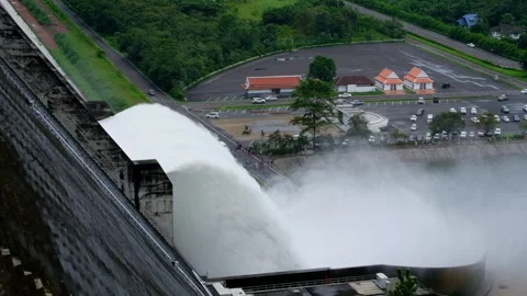 A large dam is draining because of heavy rain. Stock Footage 249606067