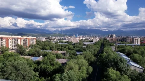 Large dark white clouds over the city of Almaty Video stock 202874655