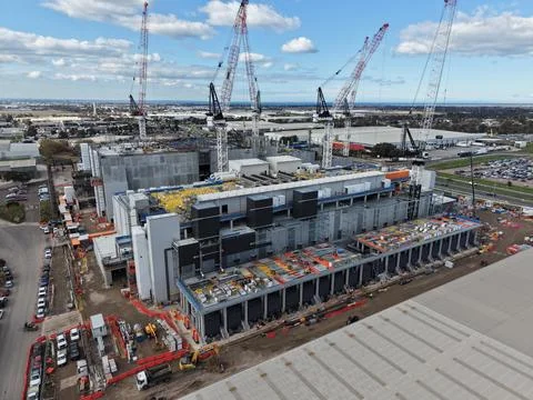 Large data center building construction with cranes Stock Photos