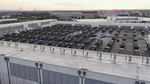 Large data center rooftop in Ashburn, Virginia at sunset with rows of server Stock Footage 333717393