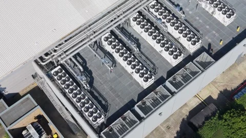 Large Data Center Rooftop With Numerous Cooling Units Operating Stock Footage 337527882