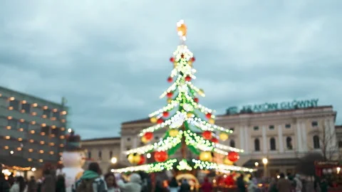 Large decorated Christmas tree on city square market at winter day Stock Footage 342244088