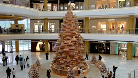 A large decorations of Christmas tree at a shopping mall in Shanghai Stock Footage 295932447