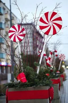 Large decorative lollipops in the shape of candy canes used to decorate a c.. Stock Photos